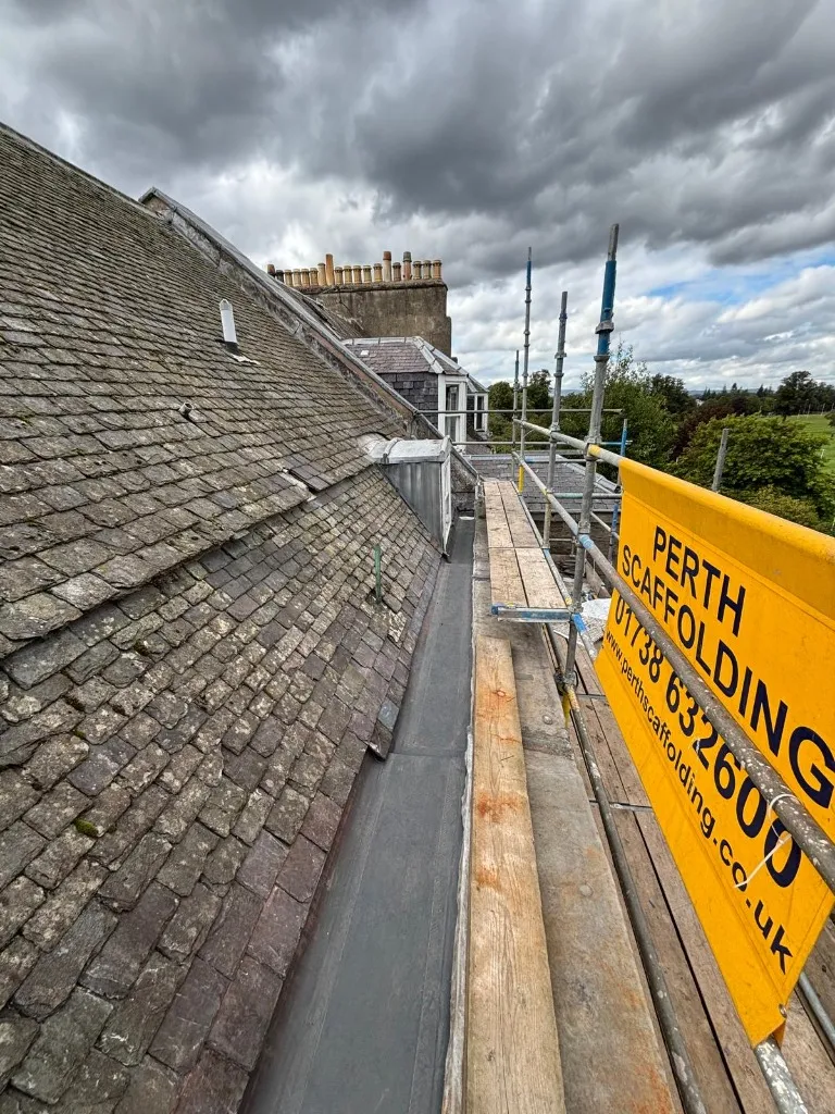 Slate roof replacement works with full scaffolding